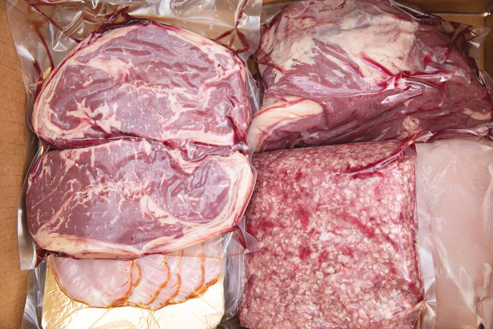 Vacuum-sealed beef cuts and ground beef packed for the freezer