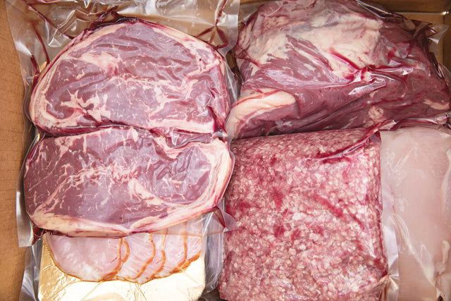Vacuum-sealed beef cuts and ground beef packed for the freezer