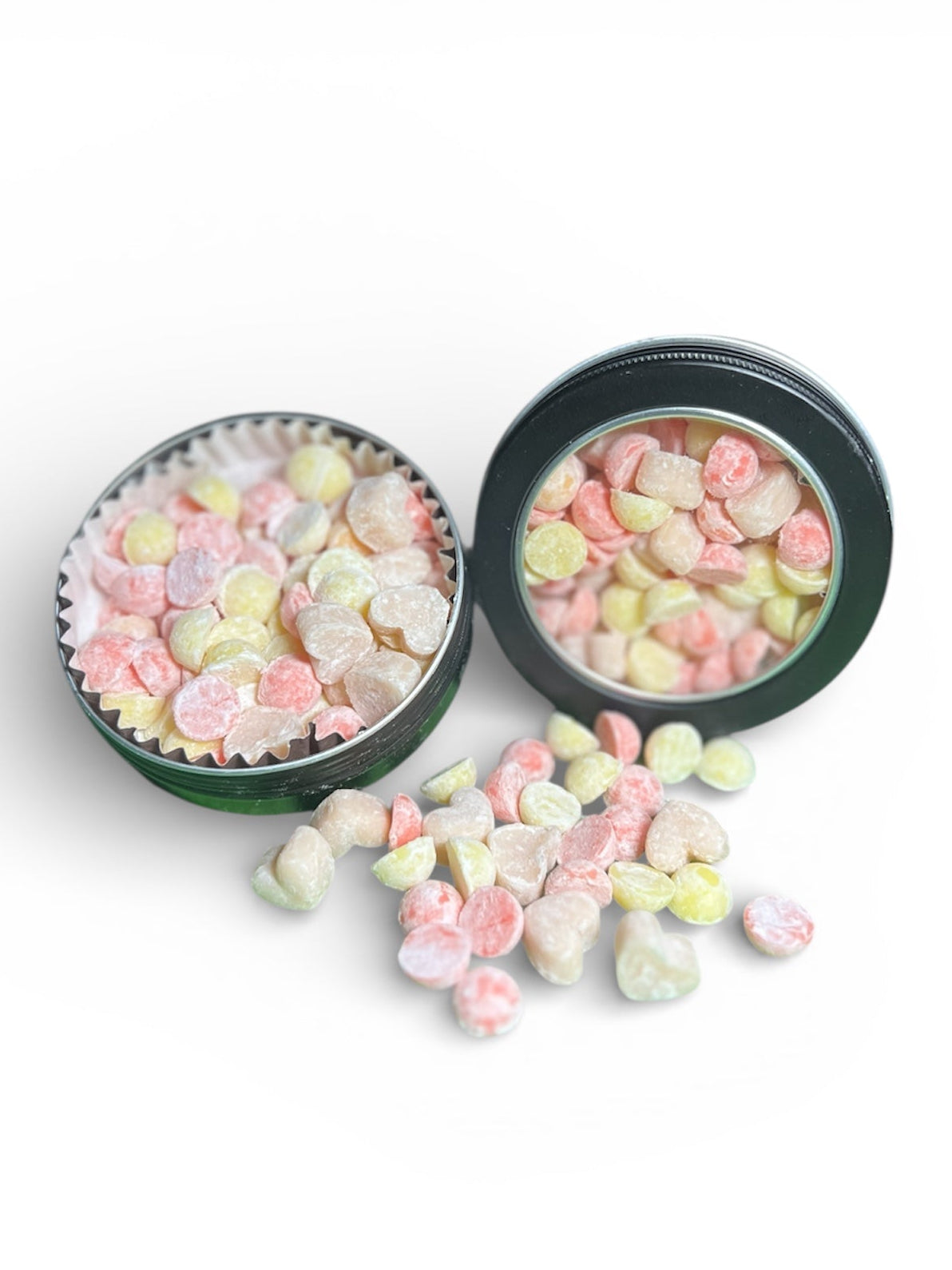 Two tins of heart shaped Rivas Ranch Tallow Hand Balm Dots