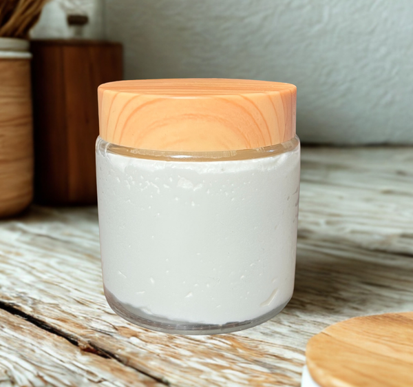 Rivas Ranch whipped tallow balm in a glass jar with wooden lid
